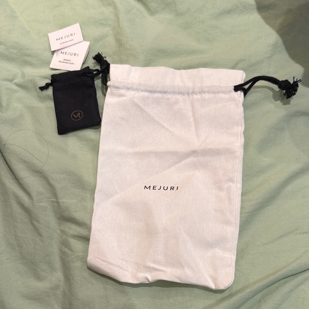 Mejuri White and Black Jewelry Pouch Set